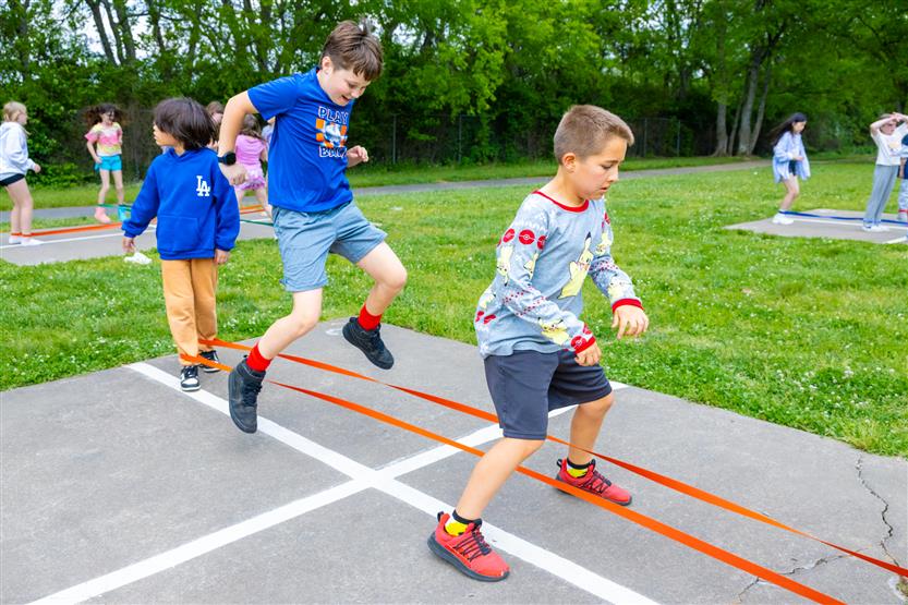 Students dance outside